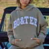 Oversized-tröja med huva i mjuk olivgrön Oversized-tröja med huva i mjuk olivgrön