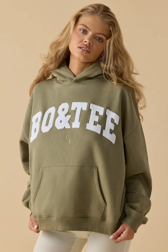 Oversized-tröja med huva i mjuk olivgrön Oversized-tröja med huva i mjuk olivgrön