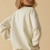 Oversized tröja med rund hals i benvit Oversized tröja med rund hals i benvit