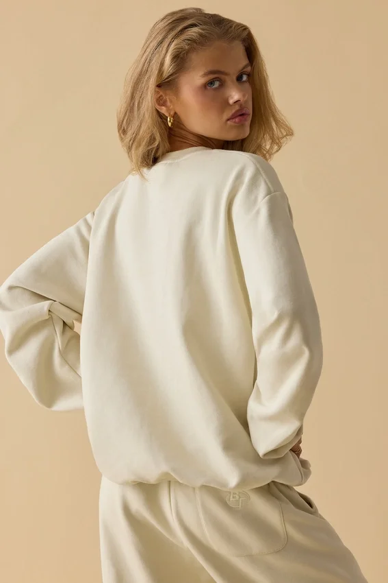 Oversized tröja med rund hals i benvit Oversized tröja med rund hals i benvit