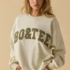 Oversized tröja med rund hals i benvit Oversized tröja med rund hals i benvit