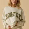 Oversized tröja med rund hals i benvit Oversized tröja med rund hals i benvit