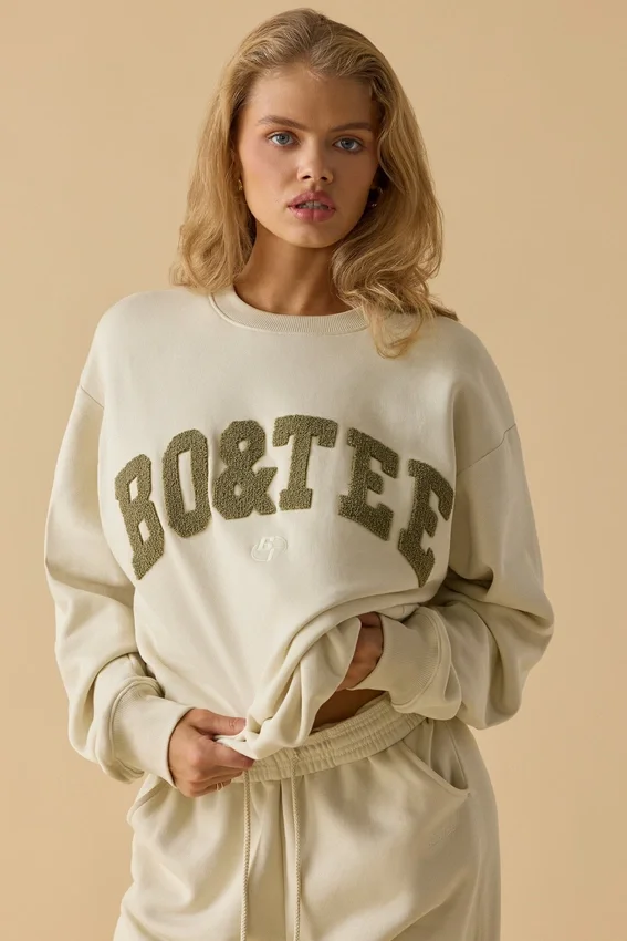 Oversized tröja med rund hals i benvit Oversized tröja med rund hals i benvit