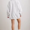 Oversized tröja med rund hals i gråmelerat Oversized tröja med rund hals i gråmelerat