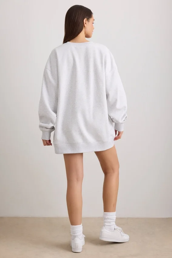 Oversized tröja med rund hals i gråmelerat Oversized tröja med rund hals i gråmelerat