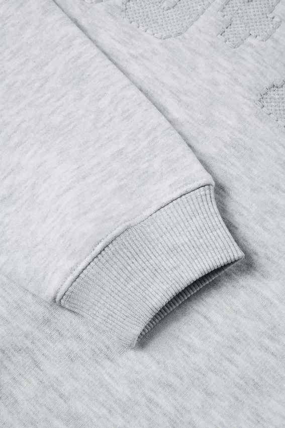 Oversized tröja med rund hals i gråmelerat Oversized tröja med rund hals i gråmelerat