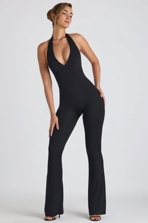 Pema Modal Jumpsuit med spetsdetaljer och utskärningar i svart Pema Modal Jumpsuit med spetsdetaljer och utskärningar i svart