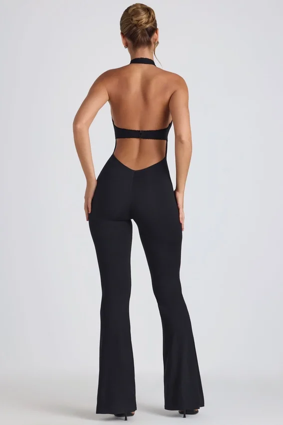 Pema Modal Jumpsuit med spetsdetaljer och utskärningar i svart Pema Modal Jumpsuit med spetsdetaljer och utskärningar i svart