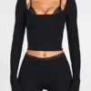 Philippa Modal Mid-Rise Flared Trousers i svart Philippa Modal Mid-Rise Flared Trousers i svart