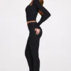 Philippa Modal Mid-Rise Flared Trousers i svart Philippa Modal Mid-Rise Flared Trousers i svart