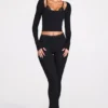 Philippa Modal Mid-Rise Flared Trousers i svart Philippa Modal Mid-Rise Flared Trousers i svart