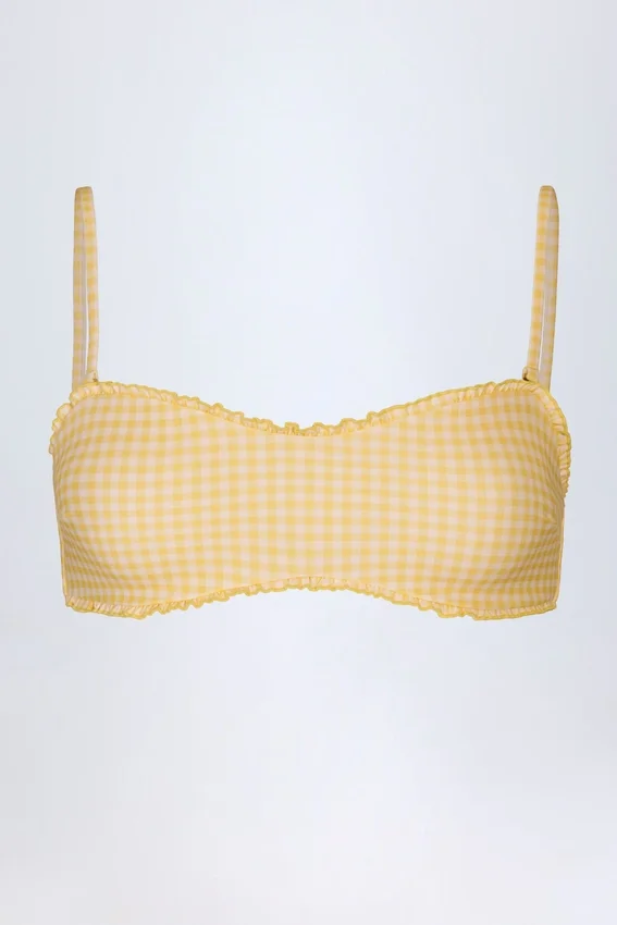 Portbou bandeau-bikinitopp med volanger i gul rutig tyg Portbou bandeau-bikinitopp med volanger i gul rutig tyg