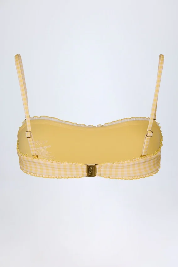 Portbou bandeau-bikinitopp med volanger i gul rutig tyg Portbou bandeau-bikinitopp med volanger i gul rutig tyg