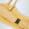 Portbou bandeau-bikinitopp med volanger i gul rutig tyg Portbou bandeau-bikinitopp med volanger i gul rutig tyg