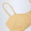 Portbou bandeau-bikinitopp med volanger i gul rutig tyg Portbou bandeau-bikinitopp med volanger i gul rutig tyg