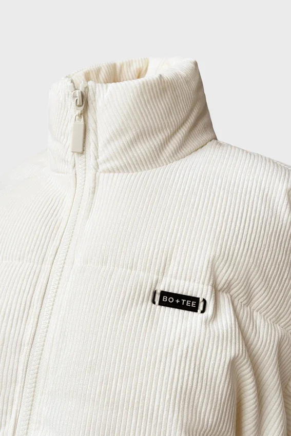Quiltad puffjacka i corduroy i färgen Ivory Quiltad puffjacka i corduroy i färgen Ivory