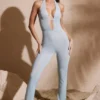 Ramona Petite Jumpsuit med utsmyckad djup urringning i Aqua Ramona Petite Jumpsuit med utsmyckad djup urringning i Aqua