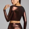 Rana crop top i metalliskt jersey med djup urringning i kopparbrons Rana crop top i metalliskt jersey med djup urringning i kopparbrons