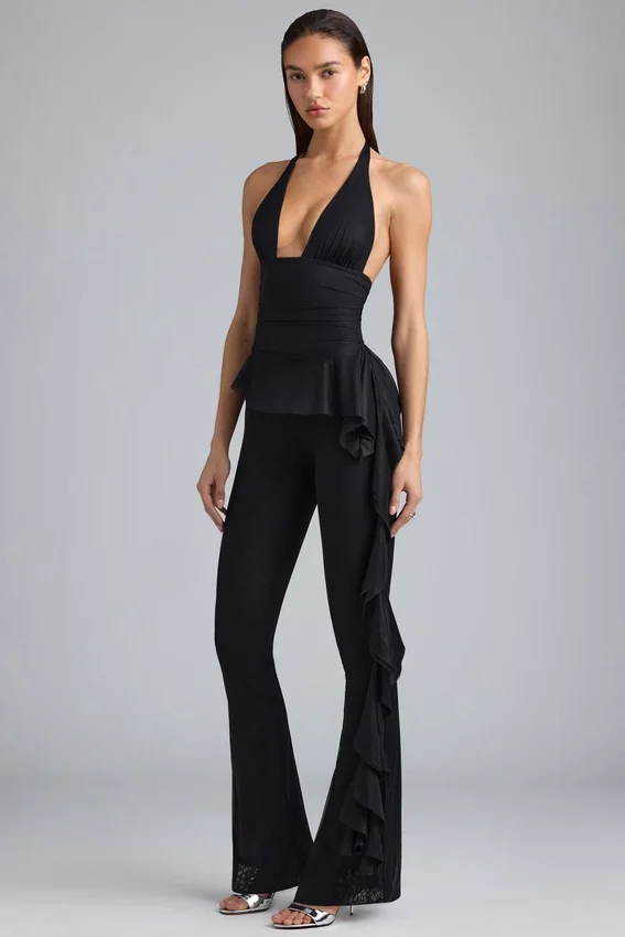Reese Metallic Ruffle Low-Rise Flared Trousers i svart Reese Metallic Ruffle Low-Rise Flared Trousers i svart