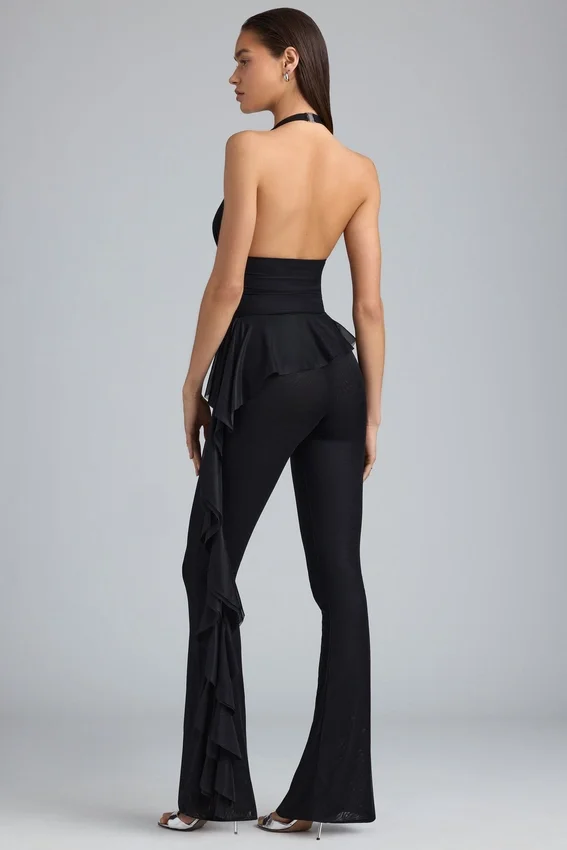 Reese Metallic Ruffle Low-Rise Flared Trousers i svart Reese Metallic Ruffle Low-Rise Flared Trousers i svart