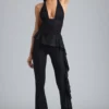 Reese Metallic Ruffle Low-Rise Flared Trousers i svart Reese Metallic Ruffle Low-Rise Flared Trousers i svart