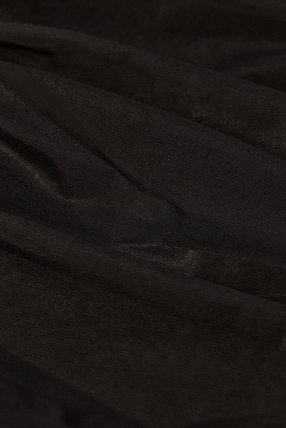 Reese Metallic Ruffle Low-Rise Flared Trousers i svart Reese Metallic Ruffle Low-Rise Flared Trousers i svart