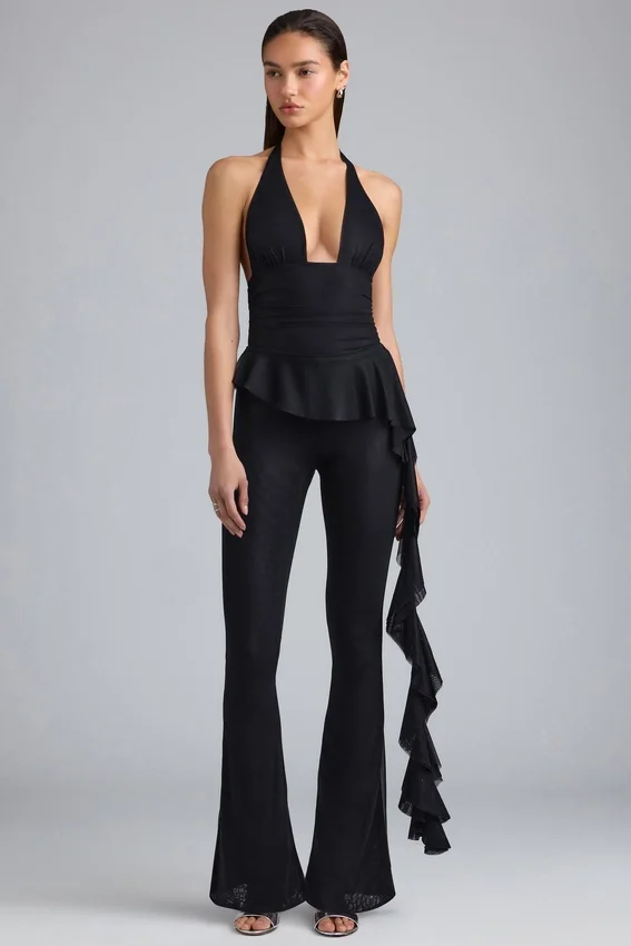 Reese Metallic Ruffle Low-Rise Flared Trousers i svart Reese Metallic Ruffle Low-Rise Flared Trousers i svart