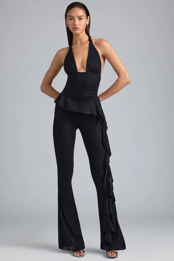Reese Metallic Ruffle Low-Rise Flared Trousers i svart Reese Metallic Ruffle Low-Rise Flared Trousers i svart