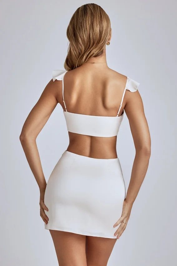 Rialta Cut Out Satin Miniklänning i Ivory Rialta Cut Out Satin Miniklänning i Ivory