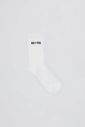 Ribbade halvhöga strumpor i vitt Ribbade halvhöga strumpor i vitt