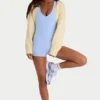 Ribbstickad kort bolero i citrongult Ribbstickad kort bolero i citrongult