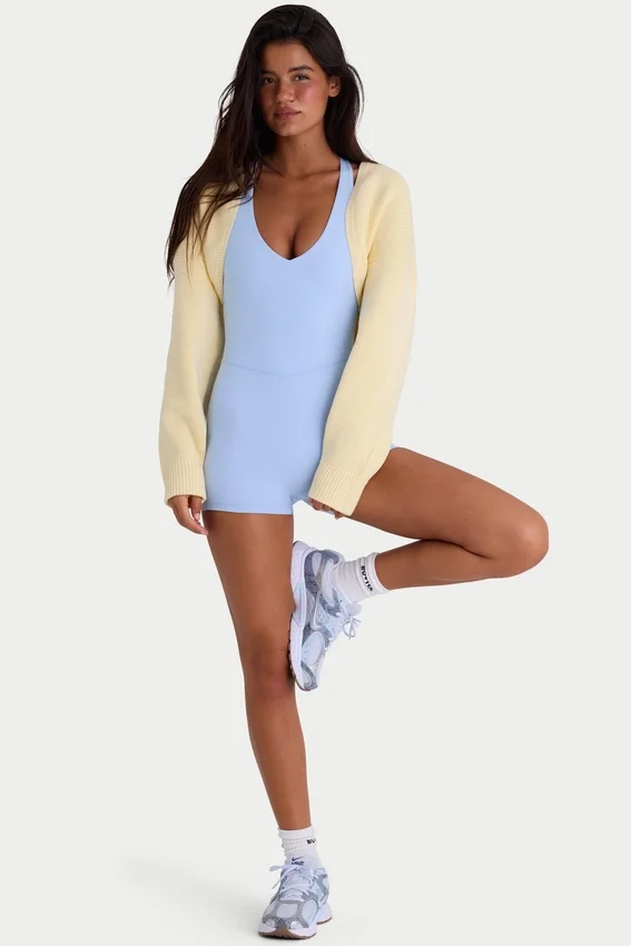 Ribbstickad kort bolero i citrongult Ribbstickad kort bolero i citrongult