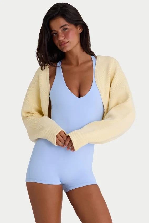Ribbstickad kort bolero i citrongult Ribbstickad kort bolero i citrongult