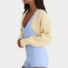 Ribbstickad kort bolero i citrongult Ribbstickad kort bolero i citrongult
