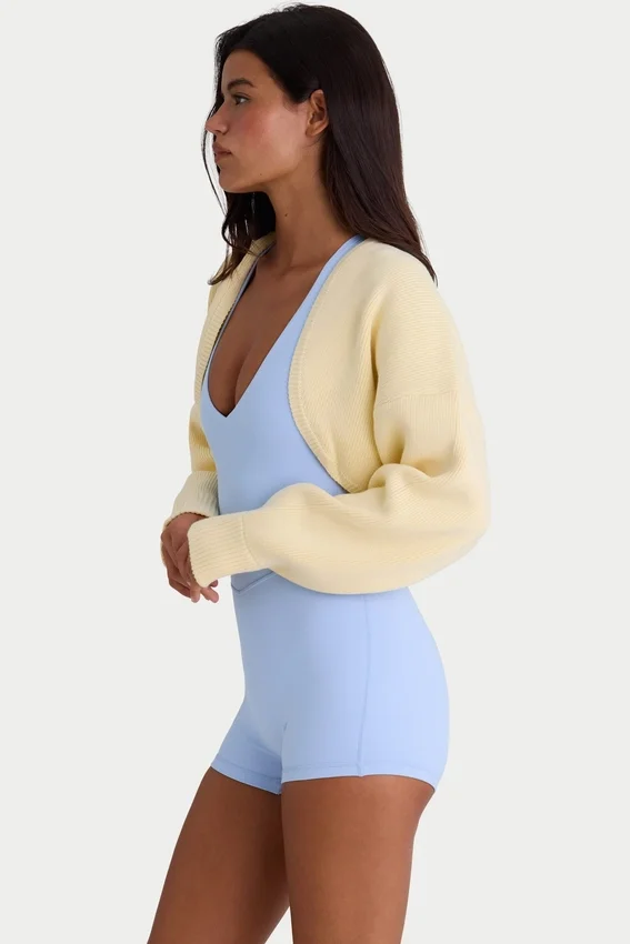 Ribbstickad kort bolero i citrongult Ribbstickad kort bolero i citrongult