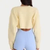 Ribbstickad kort bolero i citrongult Ribbstickad kort bolero i citrongult