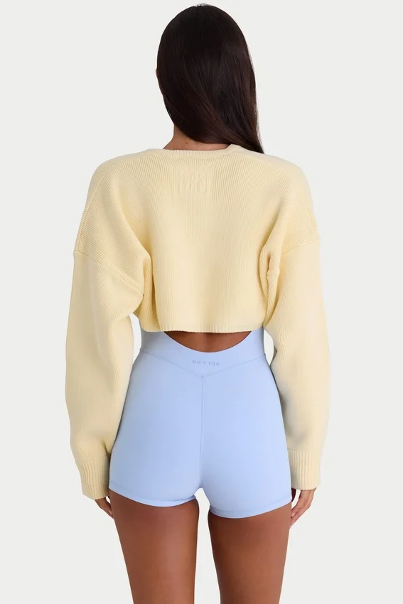 Ribbstickad kort bolero i citrongult Ribbstickad kort bolero i citrongult