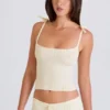 Ribbstickad linne med knytband i kräm Ribbstickad linne med knytband i kräm