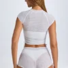 Rocas genomskinliga, rynkade minishorts i vitt Rocas genomskinliga, rynkade minishorts i vitt