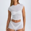 Rocas genomskinliga, rynkade minishorts i vitt Rocas genomskinliga, rynkade minishorts i vitt