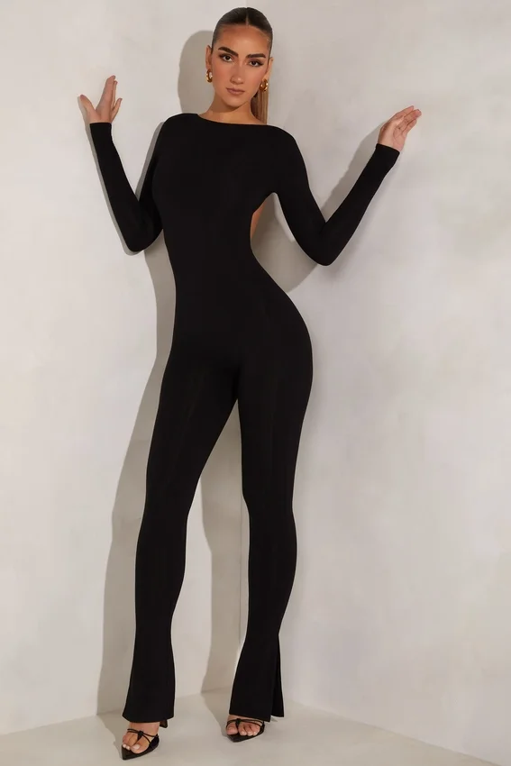 Rumer jumpsuit med hög hals och öppen rygg i svart Rumer jumpsuit med hög hals och öppen rygg i svart