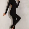 Rumer jumpsuit med hög hals och öppen rygg i svart Rumer jumpsuit med hög hals och öppen rygg i svart
