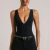 Rumi Deep Plunge Halterneck Bodys i svart Rumi Deep Plunge Halterneck Bodys i svart