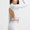 Rygglös långärmad crop top med hög hals i gråmelerad Rygglös långärmad crop top med hög hals i gråmelerad