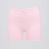 Rynkade minishorts i ljusrosa melerad Rynkade minishorts i ljusrosa melerad