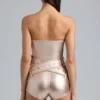 Sasha metallic-denim-korsettplaysuit med bälte i champagne Sasha metallic-denim-korsettplaysuit med bälte i champagne
