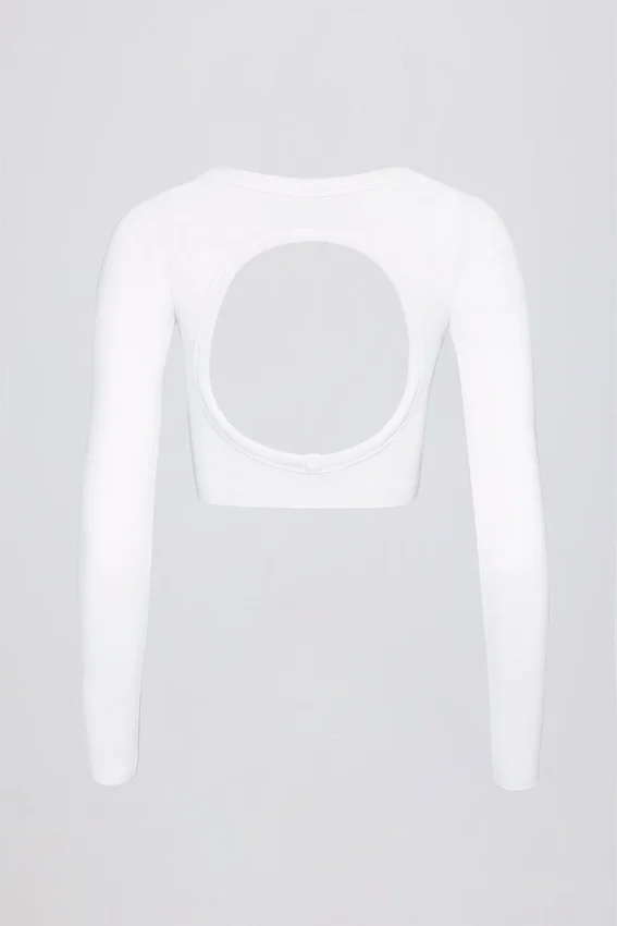 Sömlös, mjuk ribbad crop top med utskärningar i vitt Sömlös, mjuk ribbad crop top med utskärningar i vitt