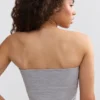 Soft Active bandeau-top med kontrastkant i melerad grå Soft Active bandeau-top med kontrastkant i melerad grå