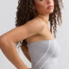 Soft Active bandeau-top med kontrastkant i melerad grå Soft Active bandeau-top med kontrastkant i melerad grå