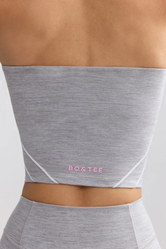 Soft Active bandeau-top med kontrastkant i melerad grå Soft Active bandeau-top med kontrastkant i melerad grå